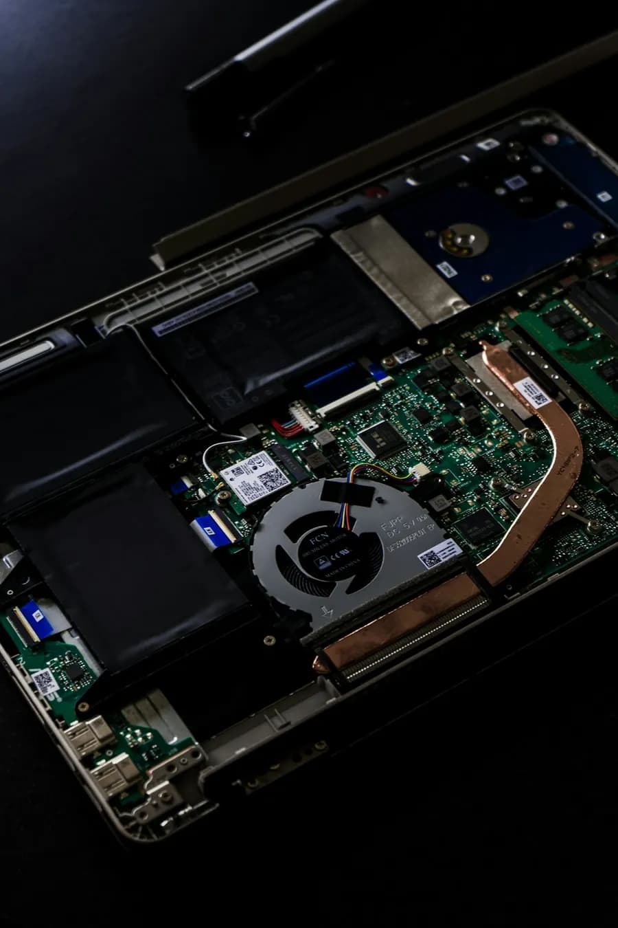 The inside of an open laptop